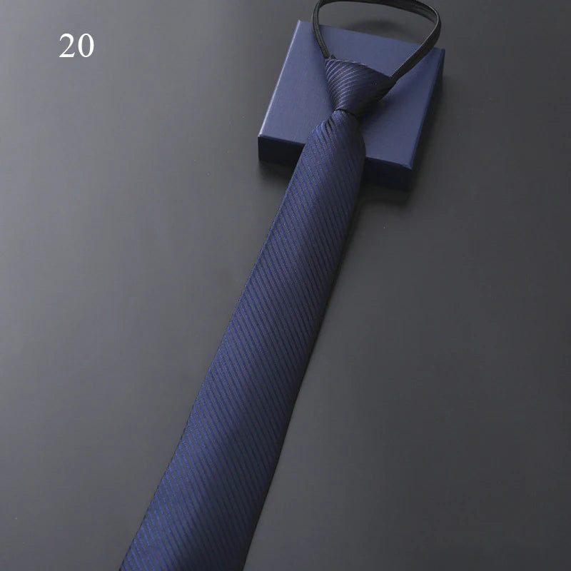 Blue tie on a gray background with a box