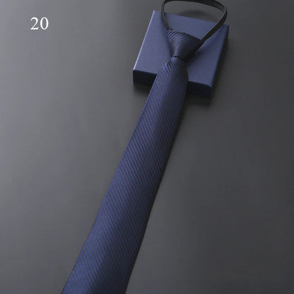 Blue tie on a gray background with a box