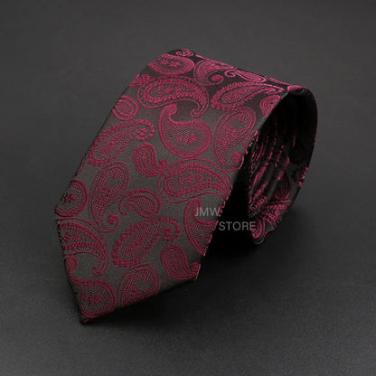 Red paisley patterned tie on a dark gray background