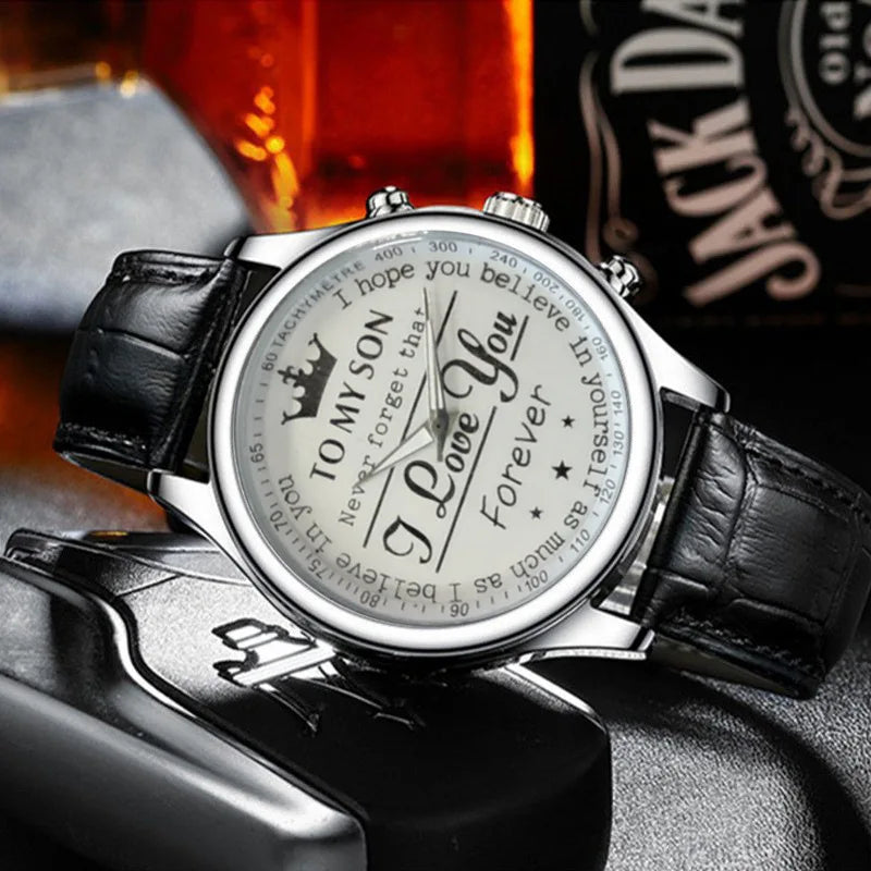 Wristwatch with romantic message on the dial against a blurred background