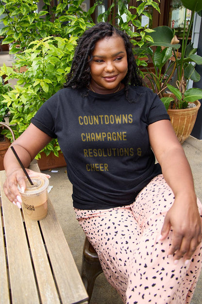 Simply Love Full Size COUNTDOWNS CHAMPAGNE RESOLUTIONS & CHEER Round Neck T-Shirt Carauana Store